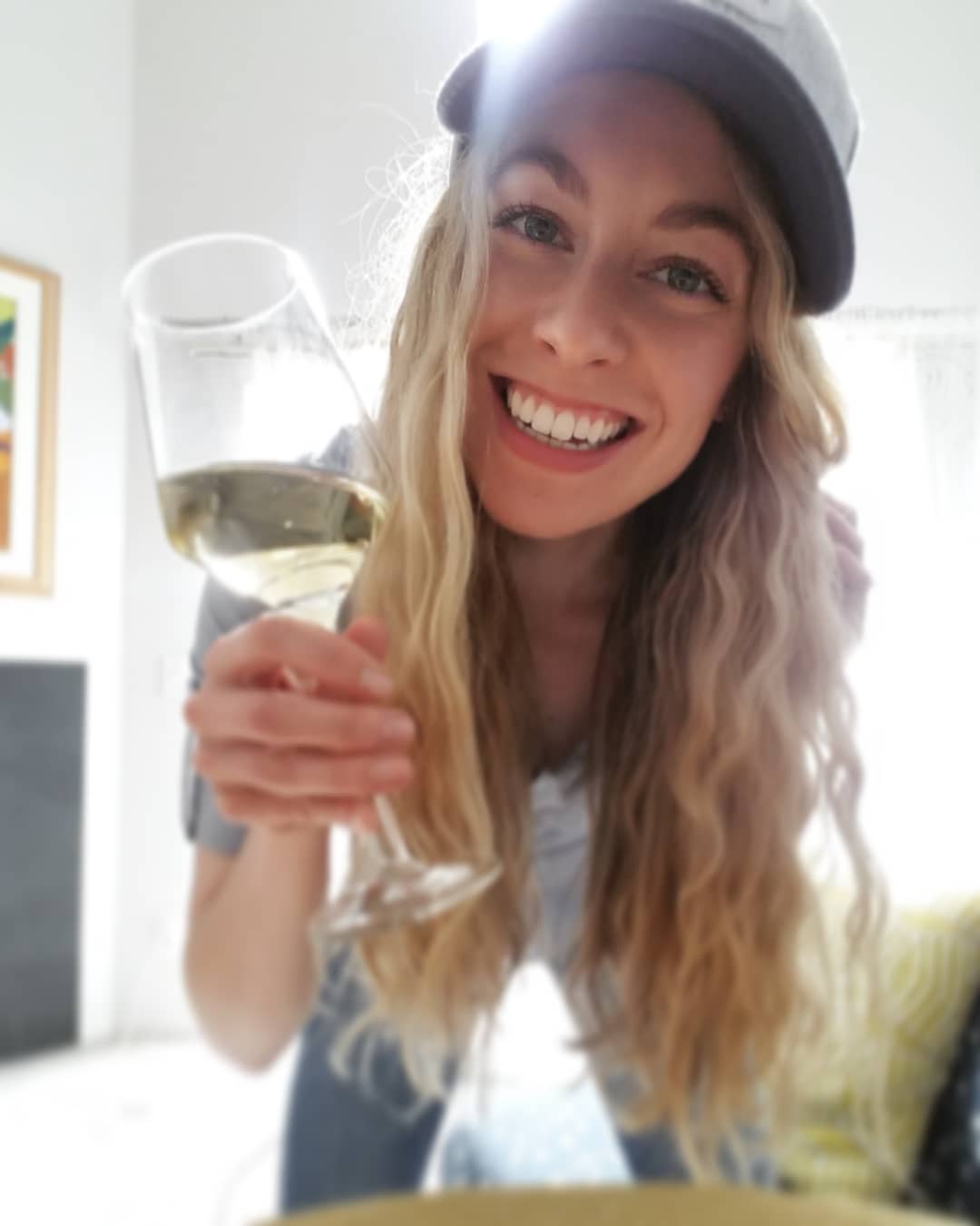 Woman drinking white wine